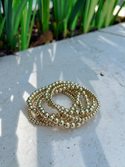 6 Piece Assorted Gold Bead Stretch Bracelet Set