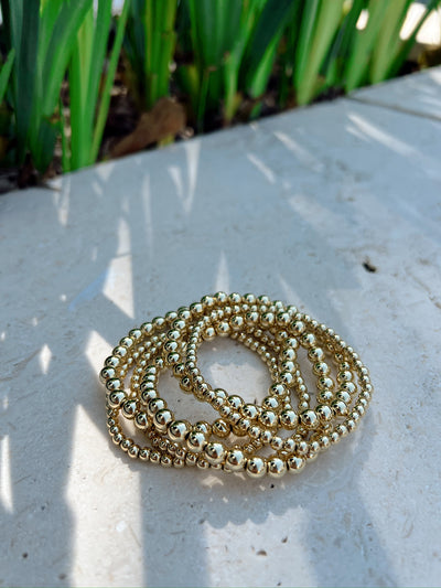 6 Piece Assorted Gold Bead Stretch Bracelet Set