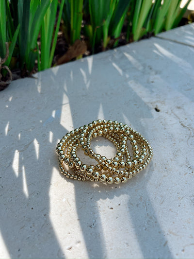 6 Piece Assorted Gold Bead Stretch Bracelet Set