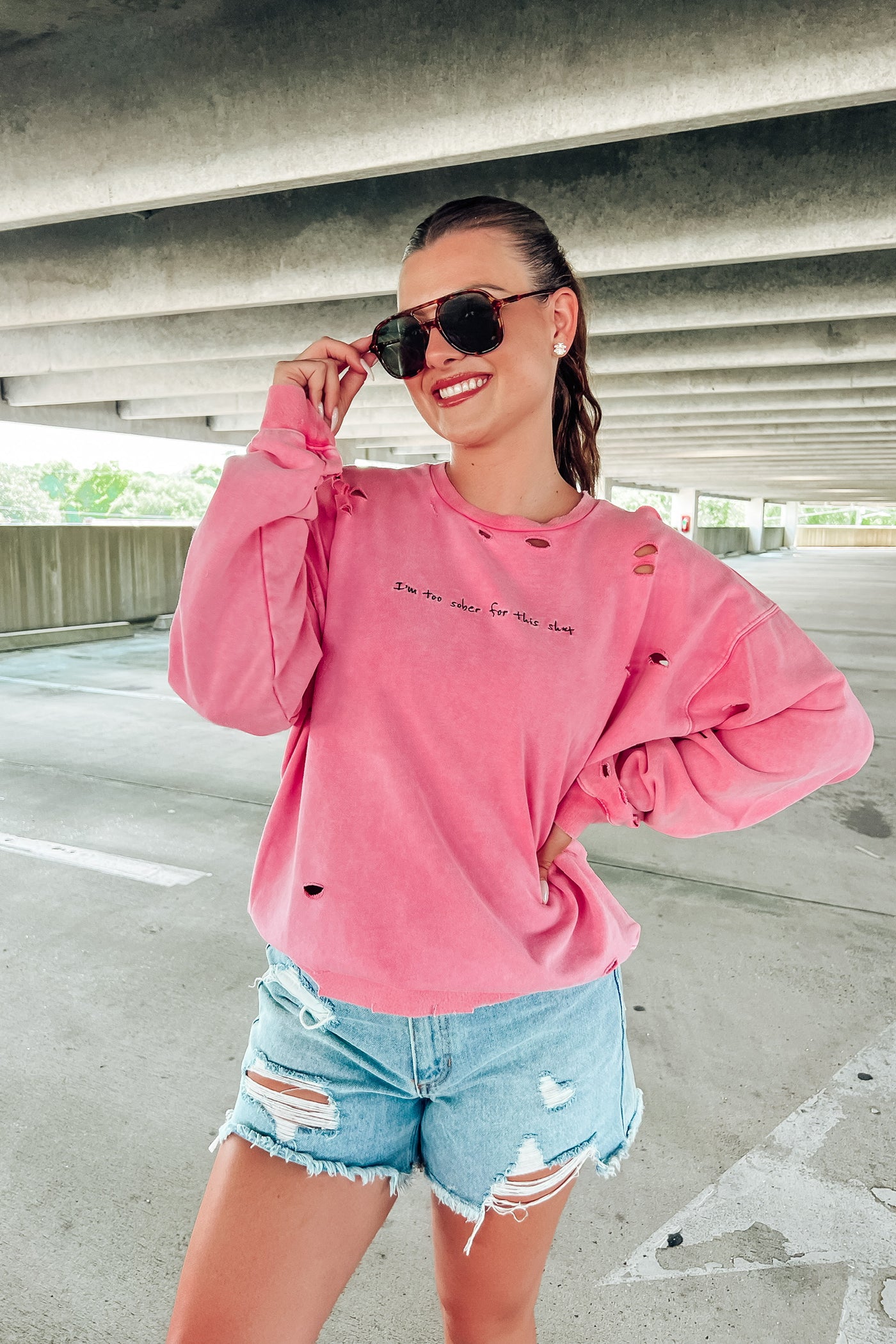 Distressed Sweater With Embroidered Verbiage