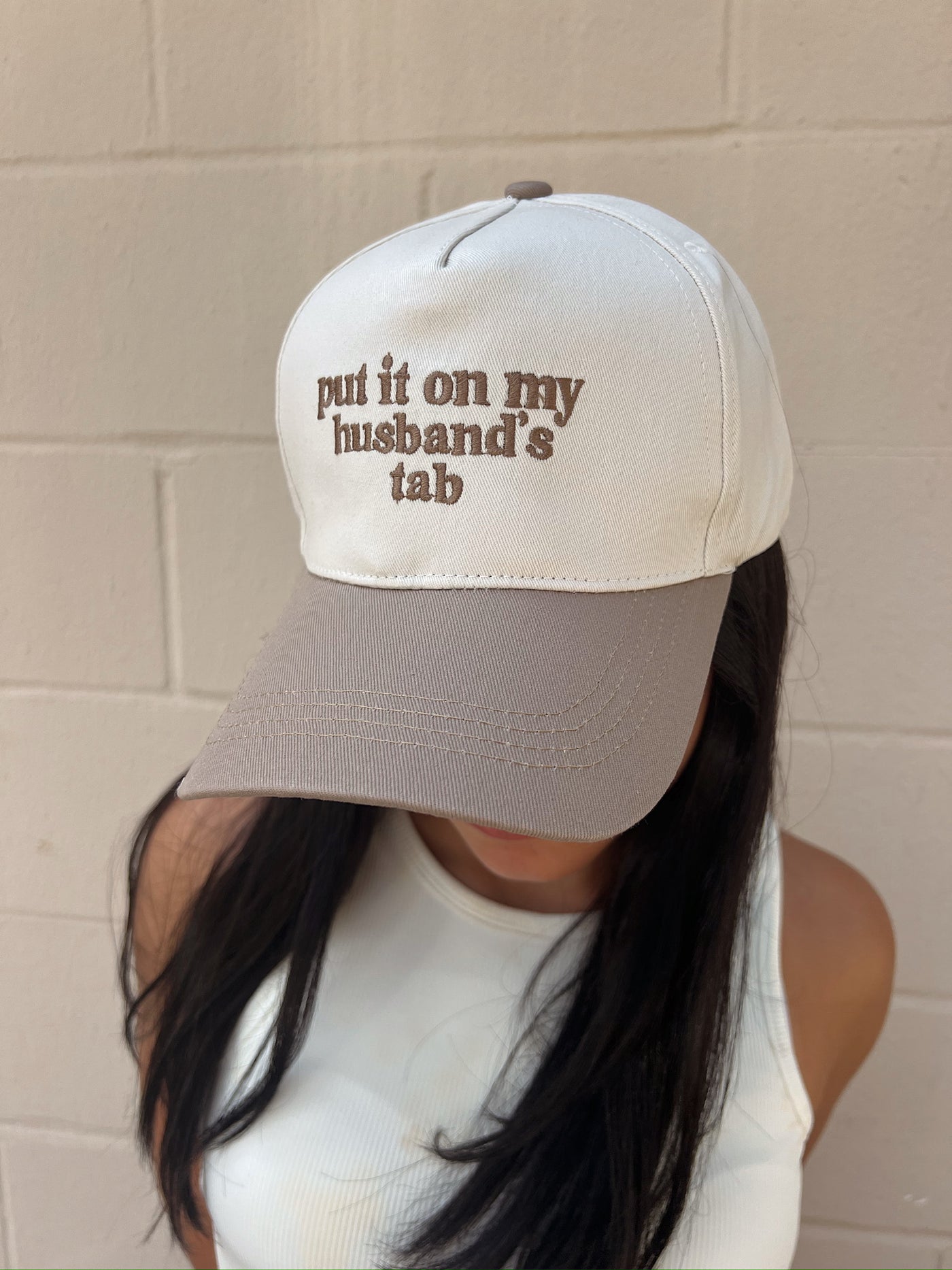 Put It On My Husband's Tab Trucker Hat
