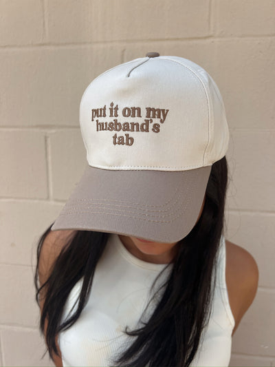 Put It On My Husband's Tab Trucker Hat